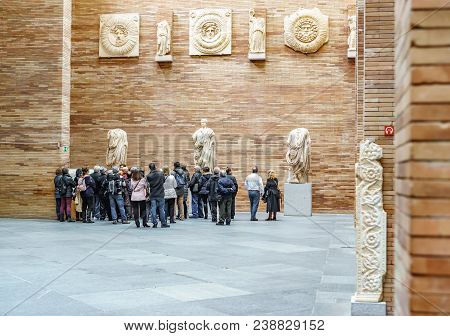 Merida, Spain - March 22, 2015. Crowd Of Tourists Visit The Roman Museum In Merida, Spain