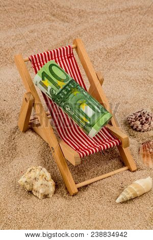 deck chair with euro bank note