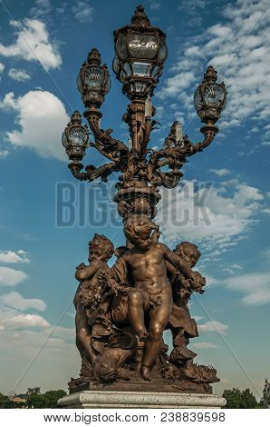 Close-up Of The The Lavishly Decorated Lamp On The Alexandre Iii Bridge At The Seine River In Paris.