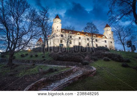 Bratislava Castle Or Bratislavsky Hrad At Night. The Main Castle Of Capital City Of Slovakia.