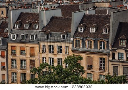 Facade Close-up Of Typical Semidetached Buildings Seen From The Center Georges Pompidou In Paris. Kn