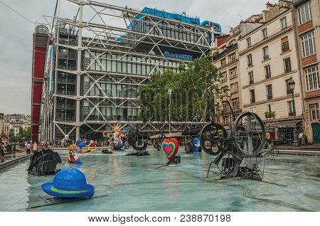 Paris, Northern France - July 09, 2017. Colorful Stravinsky Fountain In Front Of Center Georges Pomp