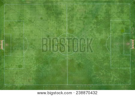 Outdoor Football Or Futsal Stadium. Made By And Green Grass. View From Fly Drone