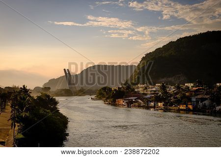 Marapendi Lagoon Seen From Above With Houses On The Hill During Sunset, Golden Light. Jet Skis Are R