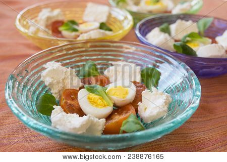 Mixed Appetiser With Spreadable Cheese, Hard Boiled Eggs And Cherry Tomatoes