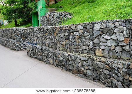 Gabion Wall. Metal Cage Filled With Rocks.