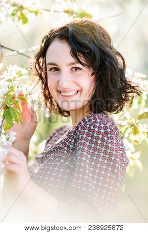 Natural Beauty, Environment, Walking Concept. Among Blooming White Flowers Of Cherry Trees There Is 