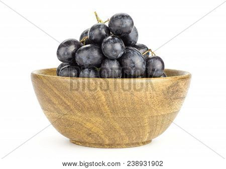 Black Purple Grape Cluster (autumn Royal Variety) In A Wooden Bowl Isolated On White Background