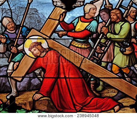 PARIS, FRANCE - JANUARY 10: 3rd Stations of the Cross, Jesus falls the first time, stained glass window in the Saint Eugene - Saint Cecilia Church, Paris, France on January 10, 2018.