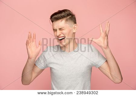 Horrible, Stress, Shock. Male Half-length Portrait Isolated At Pink Studio. Young Emotional Surprise