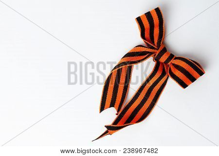 Bant Of Black And Orange Ribbons Of St. George Isolated On White Background