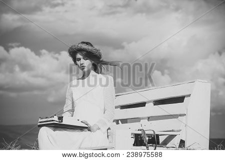 Girl In Wreath And White Dress On Bench. Vintage Equipment And Archaism. Assistant Or Secretary Work