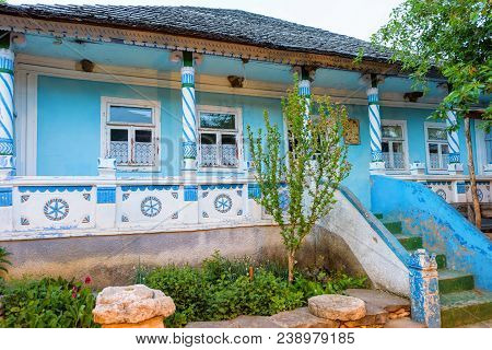 Traditional Rustic House Decorated With Wooden Ornaments