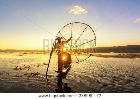 Silhouette Of Fisherman At Sunset Inle Lake Burma Myanmar