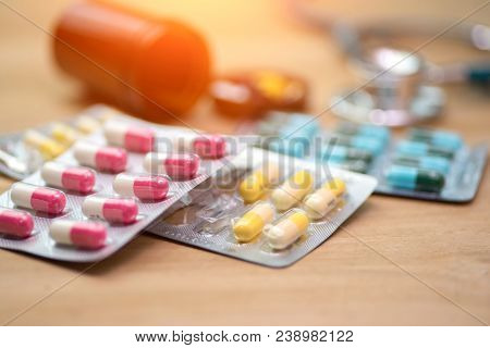 Medicine Pills Or Capsules In Hand, Palm Or Fingers Of A Doctor Or Nurse. Drug Prescription For Trea