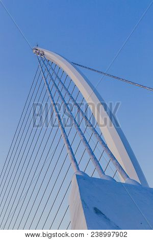 View Of Dublin's Famous Samuel Beckett Bridge Over The River Liffey At Blue Hour