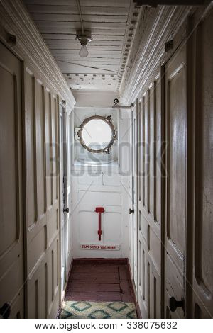 Passageway To A Porthole On An Old Passenger Vessel The S.s. Keewatin, A Victorian Era Liner That Sa