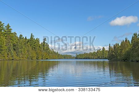 Calm Waters And Calm Skies On Horseshoe Lake In The Boundary Waters In Minnesota