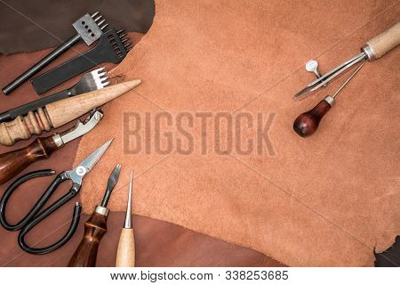 Pieces Of Leather And Working Tools. Craftman's Workspace