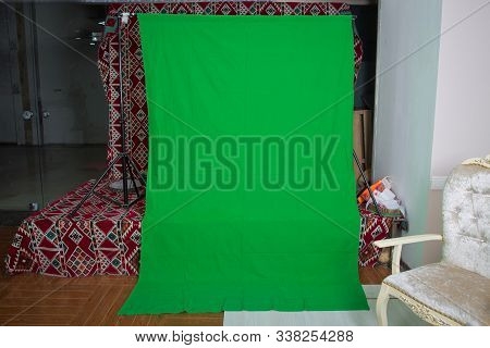 Big Green Background For Added Special Effects In Post Production.green Screen. The Chroma Key. Gree