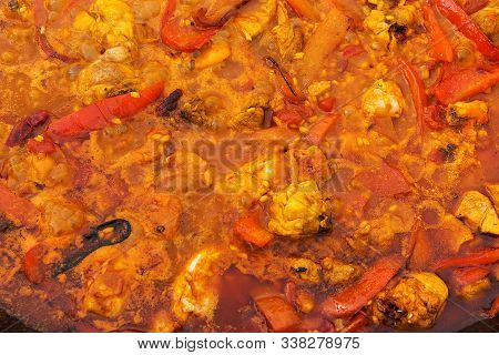 Cooking Authentic Spanish Valencian Paella With Seafood Mussels Meat Vegetables Rice In Spices Sizzl
