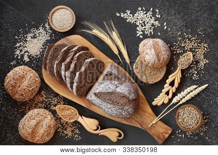 High fibre german rye bread loaf with sour dough & seeded rolls, loose grain & seeds. High in vitamins, antioxidants and omega 3. Reduces high blood pressure, cholesterol and optimise a healthy heart.
