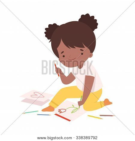Cute African American Girl Sitting On The Floor And Drawing Picture With Pencils, Adorable Young Art