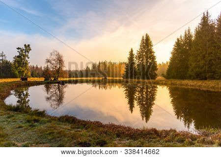 Trees Reflected In The Pond. Kladska Peat Bog National Reserve Near Marianske Lazne, Czech Republic