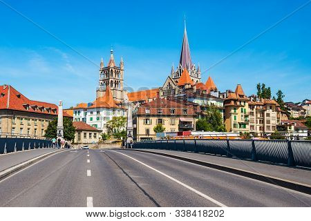 Pont Charles Bessieres Bridge And Cathedral Of Notre Dame Of Lausanne, A Church Located In The City 