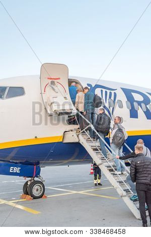 Nykoping, Sweden - September 25, 2019: Passengers Boarding Ryanair Aircraft.