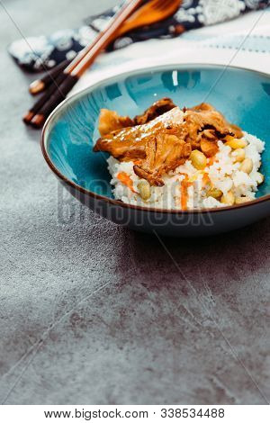 Asian style caramel pork with rice and vegetable