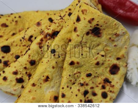 Home Made Gluten Free Chickpea Flour Roti Or Besan Roti Or Chapati Or Bread On A Plate .