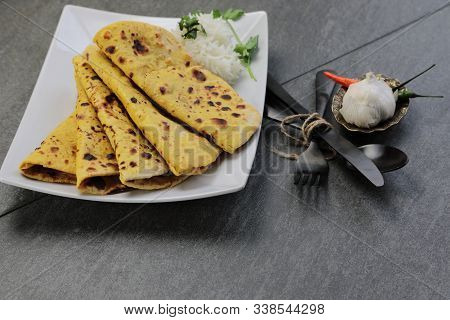Home Made Gluten Free Chickpea Flour Roti Or Besan Roti Or Chapati Or Bread On A Plate .