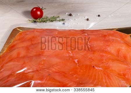Red Fish In A Sealed Vacuum Plastic Bag. Finished Product From Production
