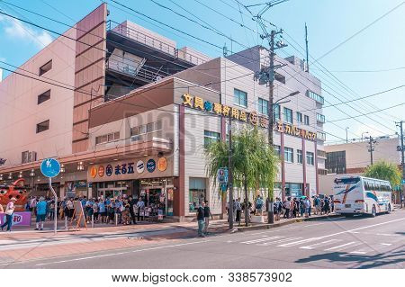 People Are Traveling In The Street Of Sakata Town.