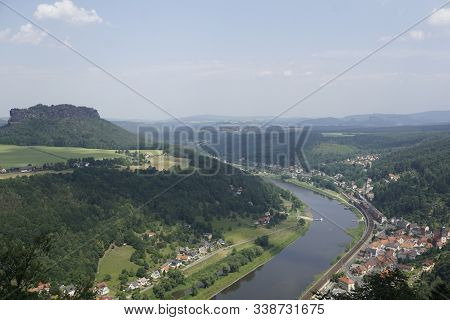 The Lilienstein With Elbe River And Koenigstein Village In Saxon Switzerland