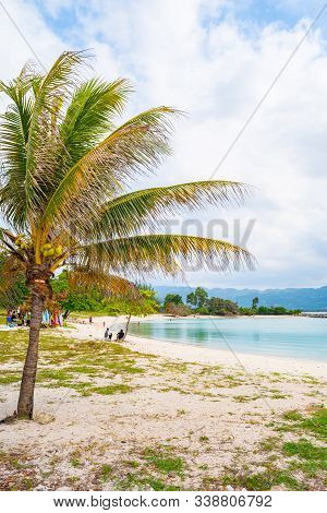 People/ Tourists/ Locals Enjoying Beautiful Morning On Tropical Caribbean Island White Sand Beach. S