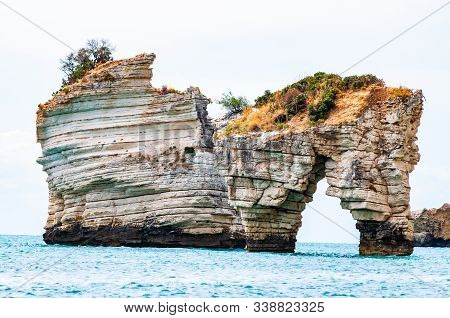 Famous Sea Stacks Of Baia Delle Zagare Bay In Gargano National Park. Natural Rock Sculptures Made By