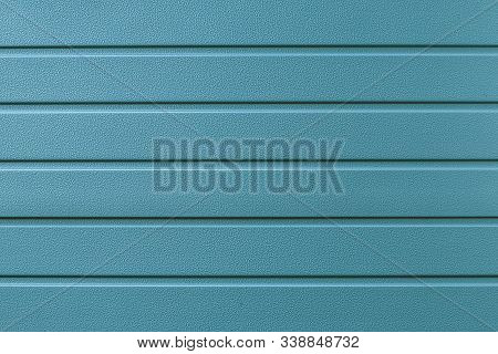 Turquoise Metal Striped Surface. Metallic Wall Siding, Cladding. Abstract Green Background, Pattern.