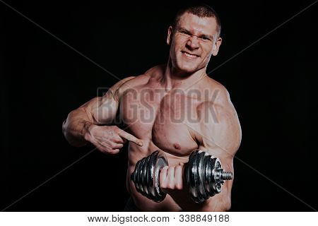 Sport The Athlete Bodybuilder Build Muscles Dumbbells