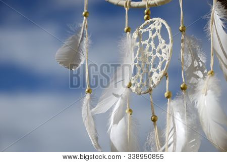 A Native American Dream Catcher Moved By Wind
