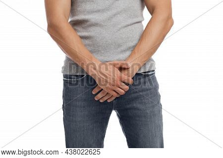 Unrecognizable Millennial European Guy Suffering From Health Problems And Pressing Hands To Groin
