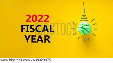 2022 Fiscal New Year Symbol. Words '2022 Fiscal Year', Isolated On Beautiful Yellow Background. Gree