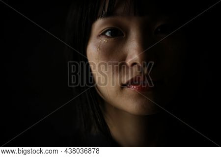 Image Of A Woman Who Sheds Tears