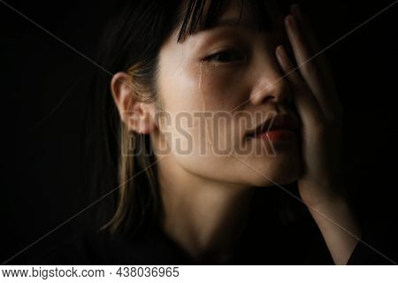 Image Of A Woman Who Sheds Tears