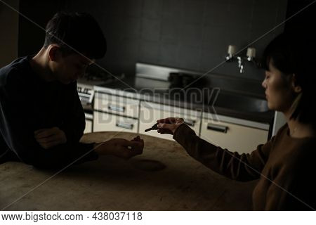Female Giving The Key To A Man