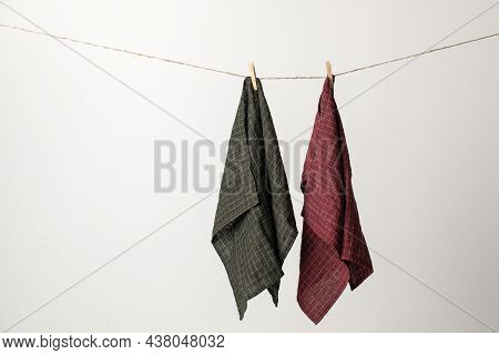 Organic Linen Kitchen Tea Towels Are Hung In A Row On A Rope. Natural, Soft, Airy And Stylish Kitche
