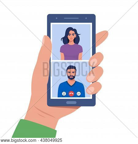 Friends Videocalling On Smartphone. Videocall Concept. Hand Holds Smartphone With Man And Woman On S