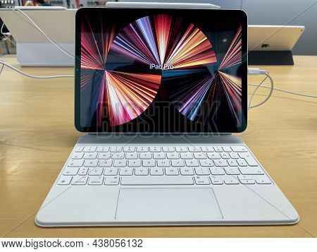 Frankfurt, Germany - October 28th 2021: A German Photographer Visiting An Apple Store, Comparing The