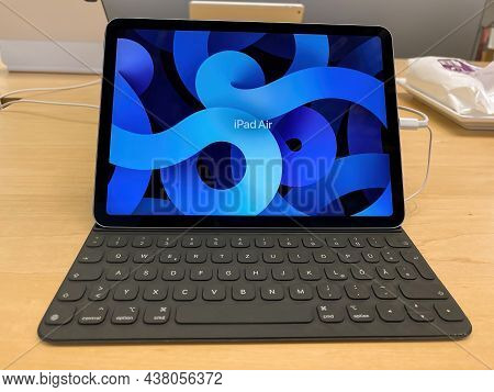 Frankfurt, Germany - October 28th 2021: A German Photographer Visiting An Apple Store, Comparing The